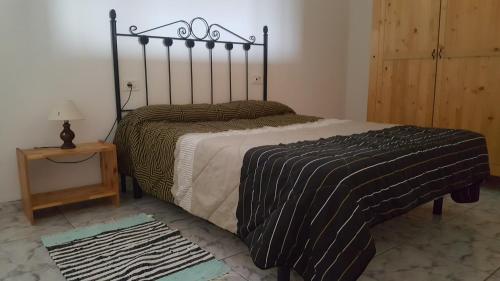 Llit o llits en una habitació de Casa Rural de Perera