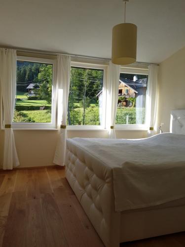 Postel nebo postele na pokoji v ubytování Haus Bergblick