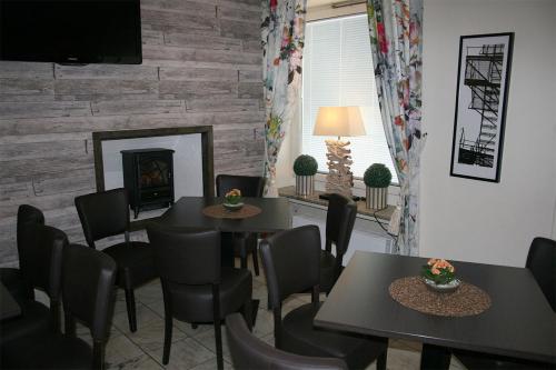 TV a/nebo společenská místnost v ubytování CarlstadCity H Boutique Hotell