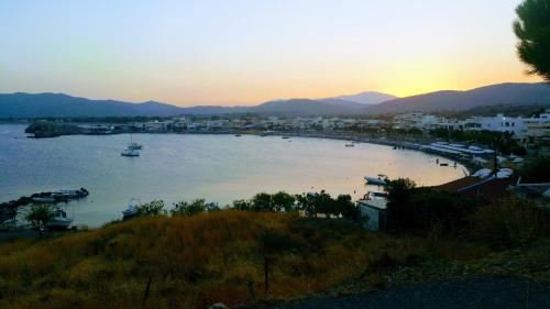 a view of a harbor with boats in the water at Haraki Beach in Haraki