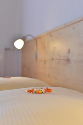 Una cama o camas en una habitación de Hotel Ausseerland