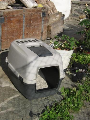 a stove sitting on the ground in a garden at Breckenbreck monolocale CIN IT7001C2P4NVWOPA in Allein