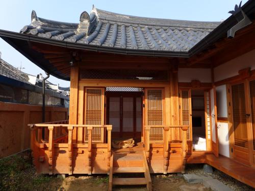 a building with a gate and a roof at Sarangroo in Jeonju