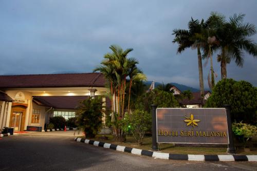 a hotel sign in front of a building at Hotel Seri Malaysia Taiping in Taiping