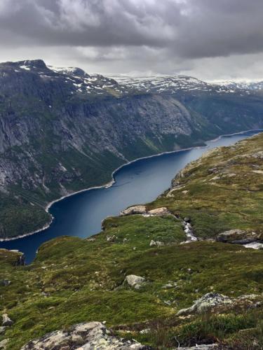 a view of a lake in the mountains at Trolltunga Studios in Odda