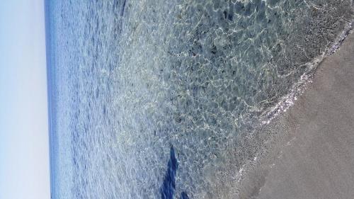 an overhead view of the ocean and the beach at A Due Passi Dal Mare in Petrosino