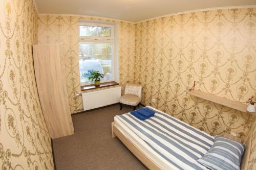 מיטה או מיטות בחדר ב-Sun Boat Apartments