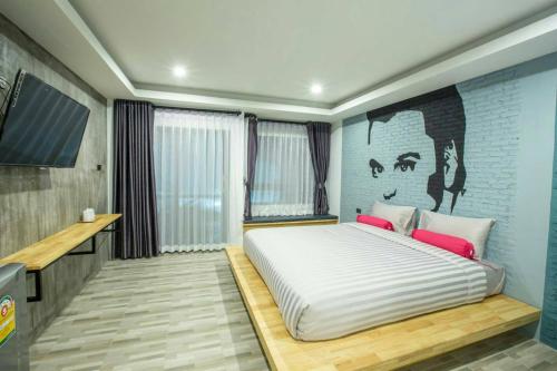 Ένα ή περισσότερα κρεβάτια σε δωμάτιο στο Sor Kor Sor Resort