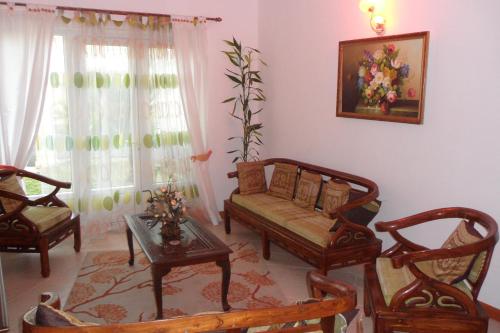 Posezení v ubytování Golden Rod villa