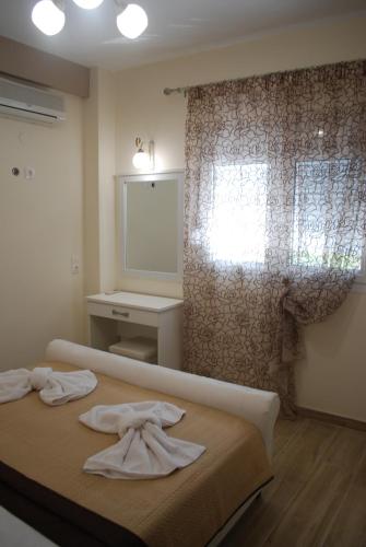 Ένα ή περισσότερα κρεβάτια σε δωμάτιο στο Family house Emerald