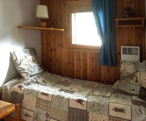 Postel nebo postele na pokoji v ubytování Les Jardins Alpins - Apartment
