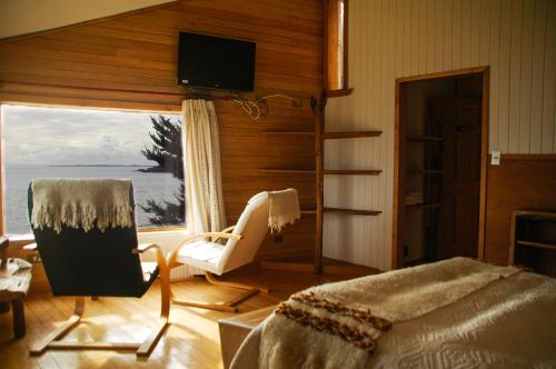 Postel nebo postele na pokoji v ubytování Hotel Faros del Sur