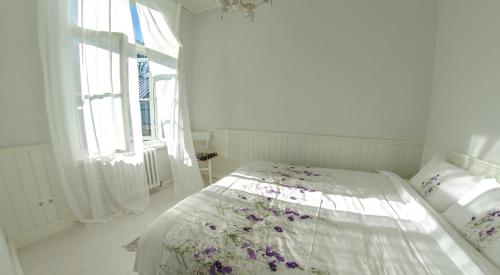 Łóżko lub łóżka w pokoju w obiekcie Linda Külaliskorter