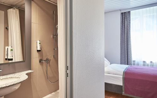 Koupelna v ubytování Hotel Central Luzern