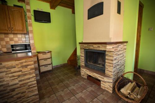 Kuchyň nebo kuchyňský kout v ubytování Chata Beňušovce