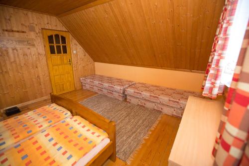 Postel nebo postele na pokoji v ubytování Chata Beňušovce