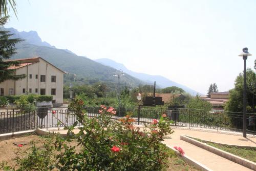 a view of a city with mountains in the background at casa vacanza sole in Tramonti