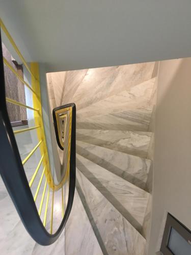 a wall with a nissan logo on it at 360Degrees Pop Art Hotel in Athens