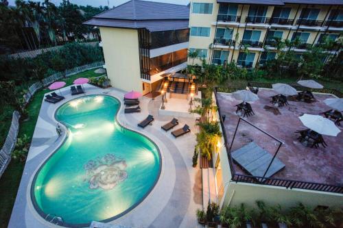 an overhead view of a swimming pool at a hotel at Mountain Creek Wellness Resort Chiangmai in Chiang Mai