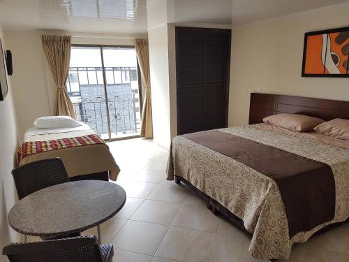 Postel nebo postele na pokoji v ubytování Hotel Castellana Group