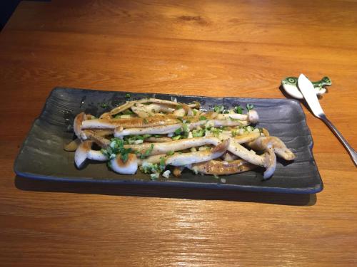 a plate of food with sausages and vegetables on a table at 輕塵別院Serenegray B&B in Wujie