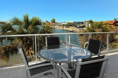 A balcony or terrace at Serenity Waters 6 - Pristine Two Bedroom Apartment with Water Views