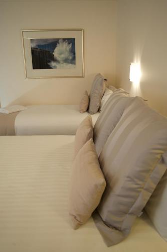 Katil atau katil-katil dalam bilik di SureStay Hotel by Best Western The Clarence on Melville