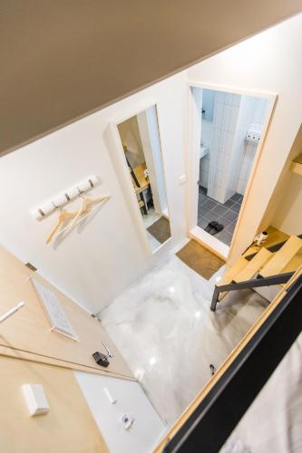 a room with a counter and two mirrors at Hotel Baroato 2nd in Seoul