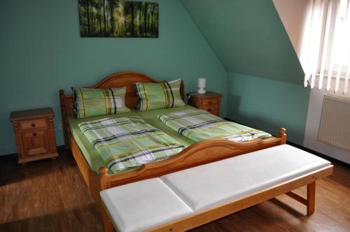Ένα ή περισσότερα κρεβάτια σε δωμάτιο στο Ferienhaus Müller