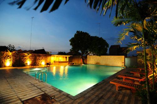 The swimming pool at or close to favehotel Rembang
