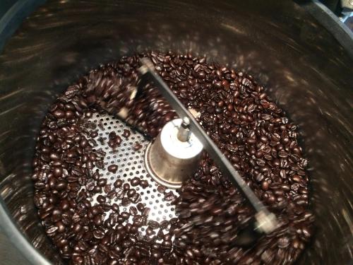 a bunch of coffee beans in a metal bowl at Guest House Yasube in Sapporo