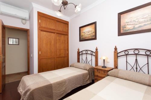 Postel nebo postele na pokoji v ubytování Casa Guisguey