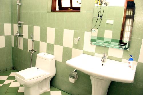 Kopalnica v nastanitvi Perera Homestay
