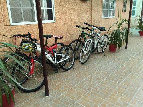 a group of bikes parked next to a building at Mutrah Hotel in Muscat