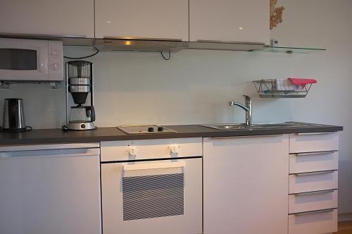 Dapur atau dapur kecil di Apartment Ulsteinvik