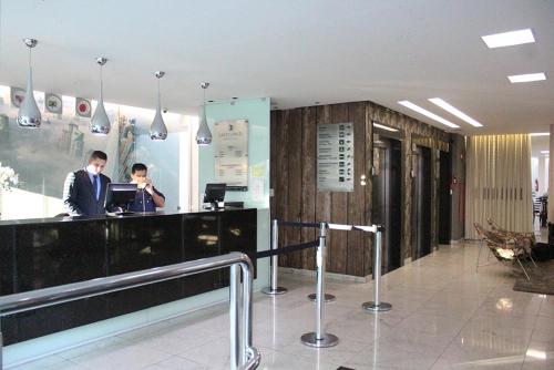 Lobi atau kawasan kaunter penerimaan di Excellence Comfort Hotel