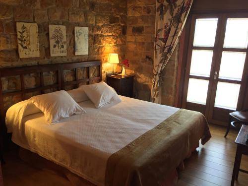 Postel nebo postele na pokoji v ubytování Posada Las Mayas