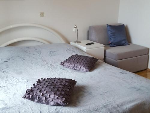 Postel nebo postele na pokoji v ubytování Apartments Anita