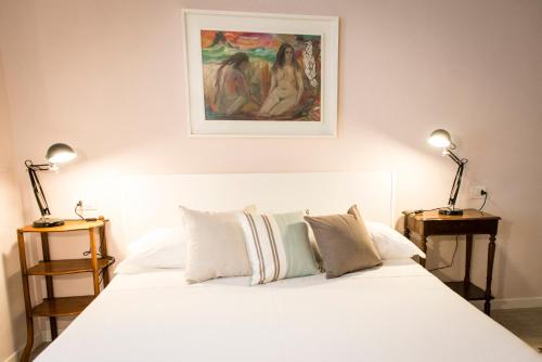 מיטה או מיטות בחדר ב-La Casa di Celeste