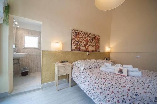 Katil atau katil-katil dalam bilik di Albergo Etruria