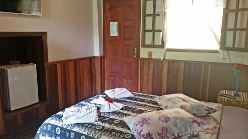 Postel nebo postele na pokoji v ubytování Pousada Sol Nascente