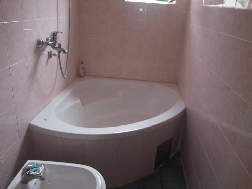 Ένα μπάνιο στο Apartments Lord