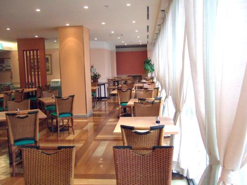 A restaurant or other place to eat at Hotel Pearl City Akita Kawabata