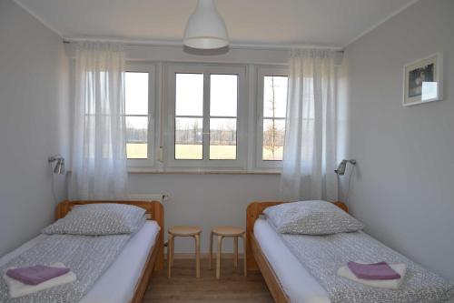 Krevet ili kreveti u jedinici u objektu Gaestehaus Feldmann