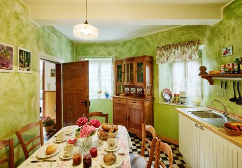 a kitchen with a table with food on it at Ferienhaus Wagner in Bernkastel-Kues