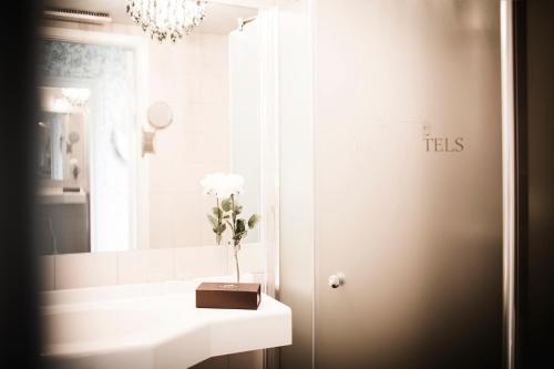 Ett badrum på Freys Hotel