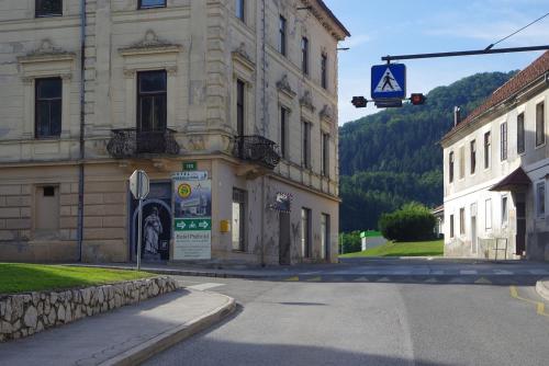 a traffic light in front of a building on a street at Hotel Prebold in Prebold