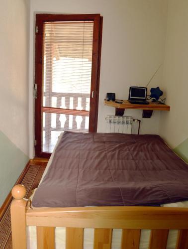 Ένα ή περισσότερα κρεβάτια σε δωμάτιο στο "Athos"apartment potkrovlje
