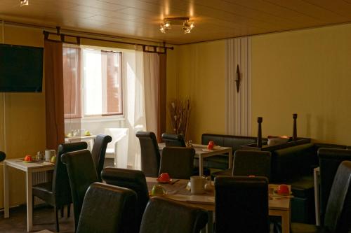 Un restaurant sau alt loc unde se poate mânca la Apartment-Hotel Rackwitz