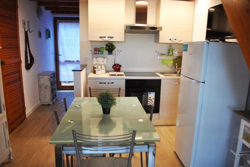 Virtuvė arba virtuvėlė apgyvendinimo įstaigoje Tigullio Vacations: lo Chalet sul Mare